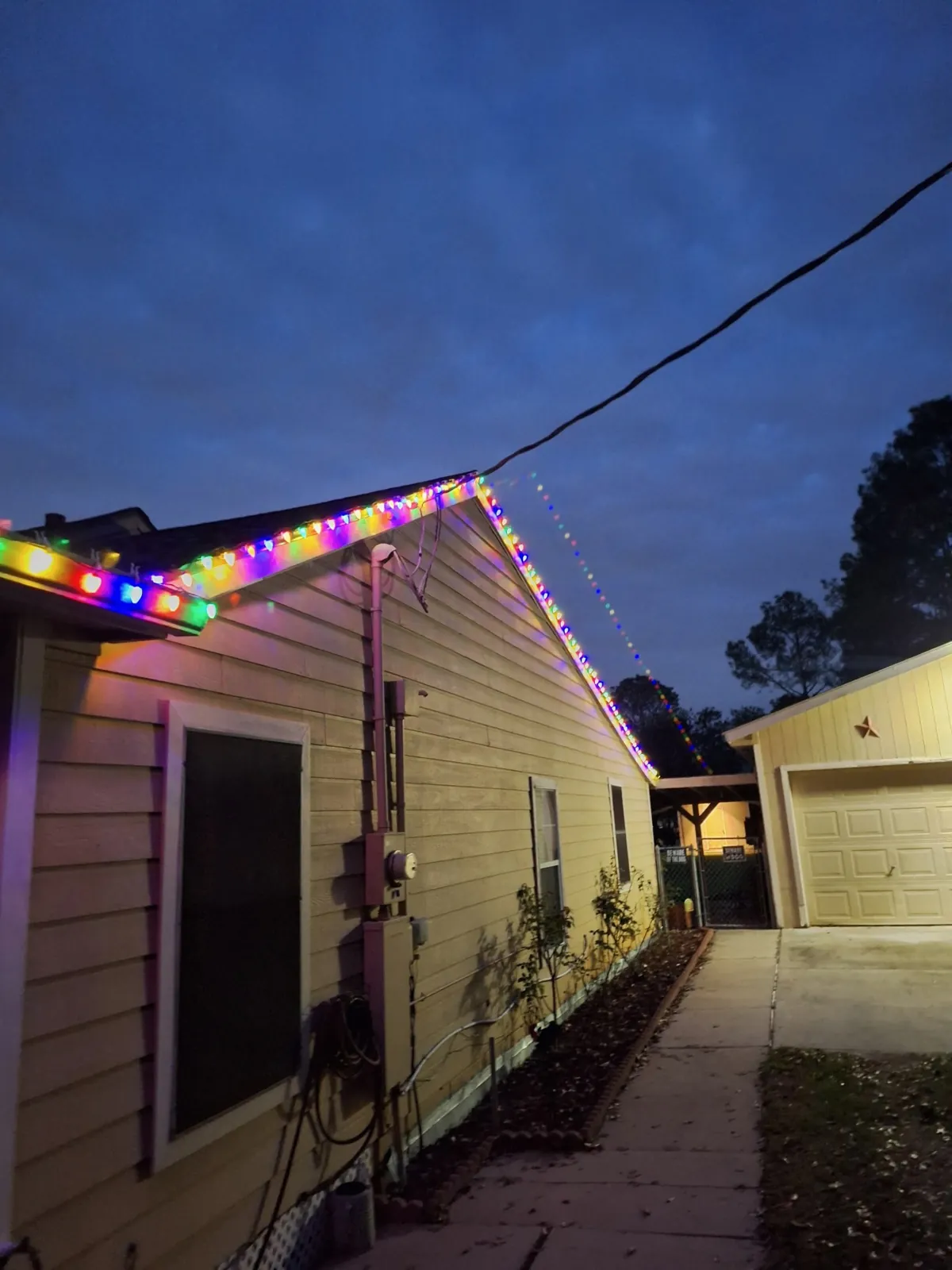House gable lit in multicolor lights